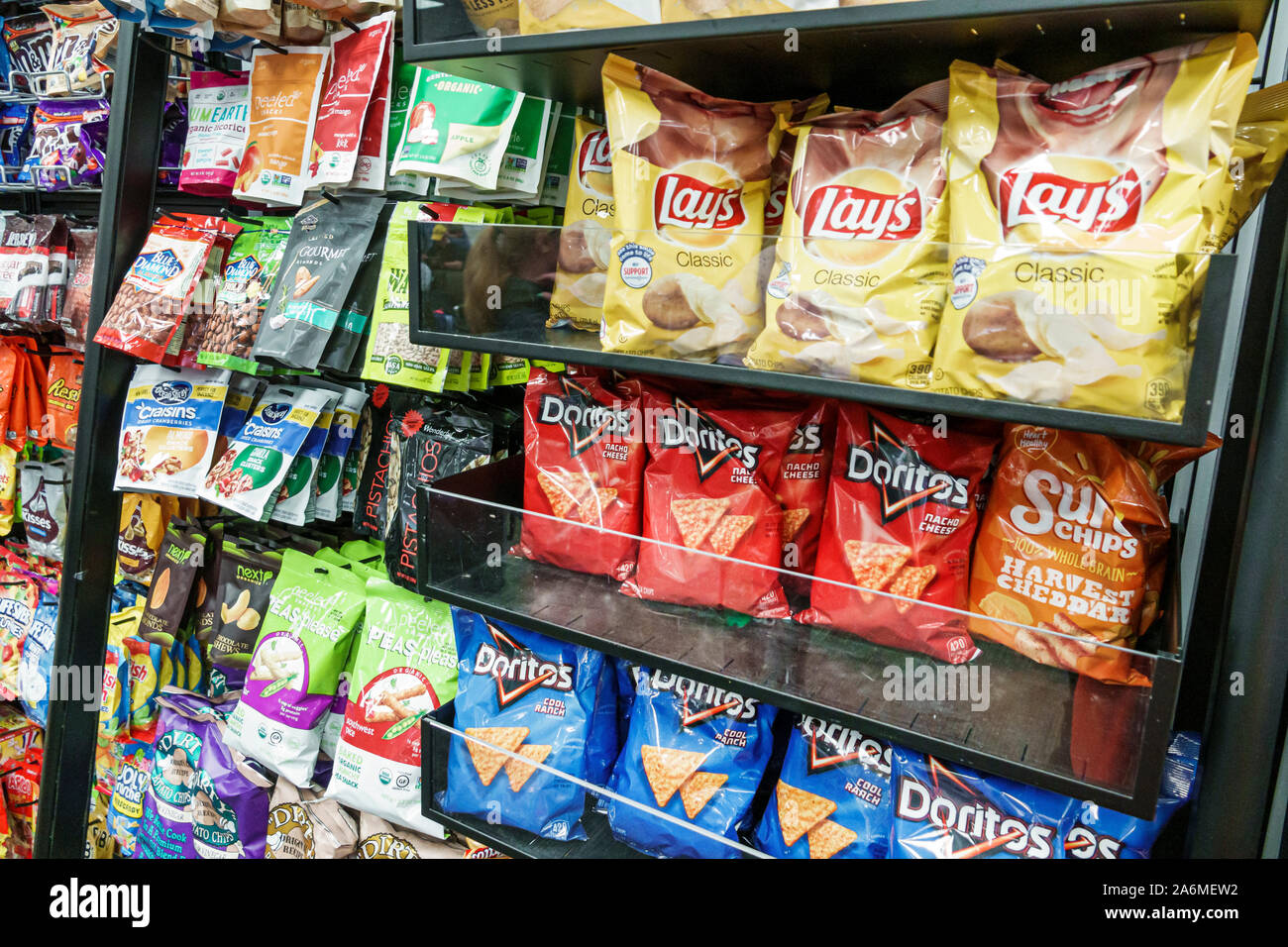 Fort Ft. Lauderdale Florida,Fort Lauderdale-Hollywood International Airport FLL,Terminal 2,snack shop,potato chips crisps,Doritos,Lay's,nuts,display s Stock Photo