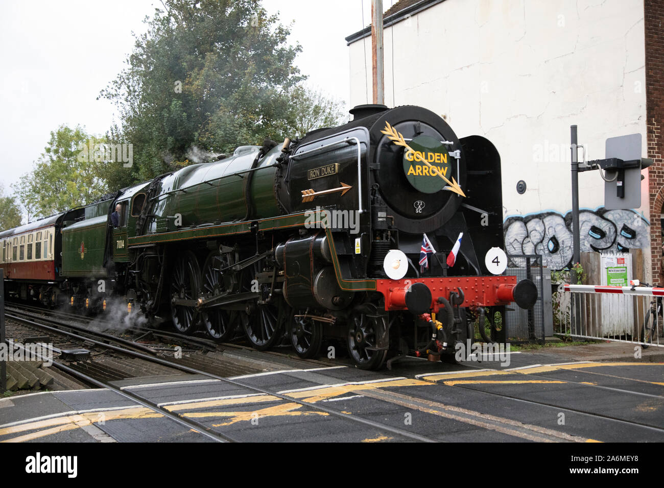 BR Standard class 7 steam locomotive 70014 Iron Duke passing St Dunstans level crossing, Canterbury, Kent whilst hauling the Golden Arrow on 26/10/19. Stock Photo