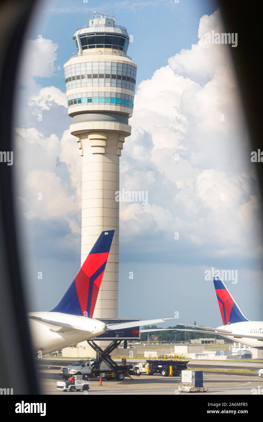 Georgia,Atlanta,Hartsfield-Jackson Atlanta International Airport,Delta Airlines hub,air traffic control tower,view through aircraft window,jet tails,t Stock Photo