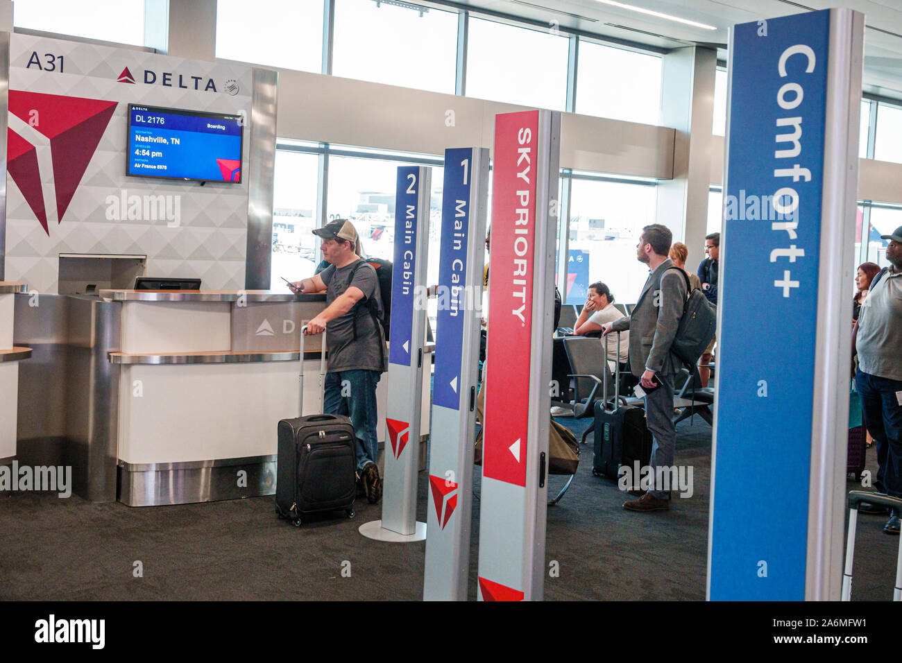 Georgia,Atlanta,Hartsfield-Jackson Atlanta International Airport,terminal,inside interior,gate,Delta Airlines,flight boarding,main cabin,Sky Priority, Stock Photo