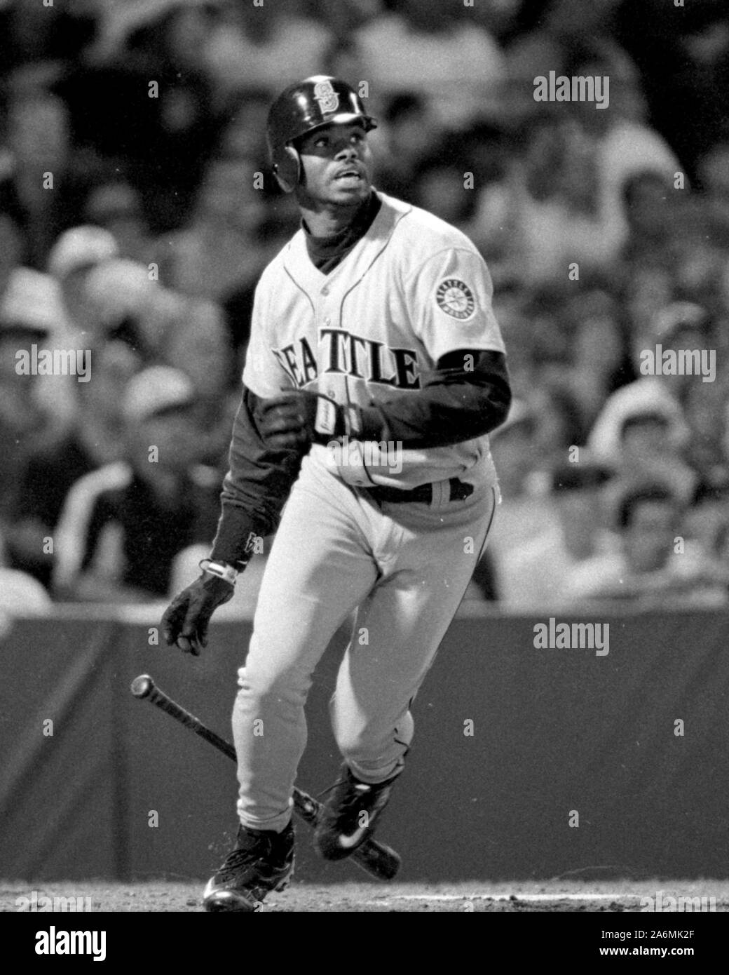 Seattle Mariners Ken Griffy jr watches his home run fly off during a game against the Boston Red Sox at Fenway Park in Boston Ma USA 1996 photo by bill belknap Stock Photo