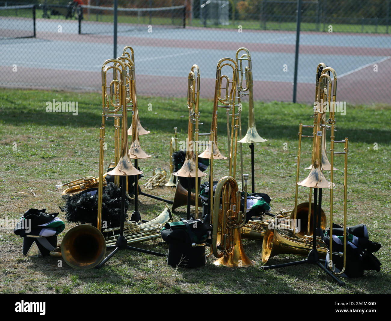 Trombones on a field at a high school pep rally Stock Photo
