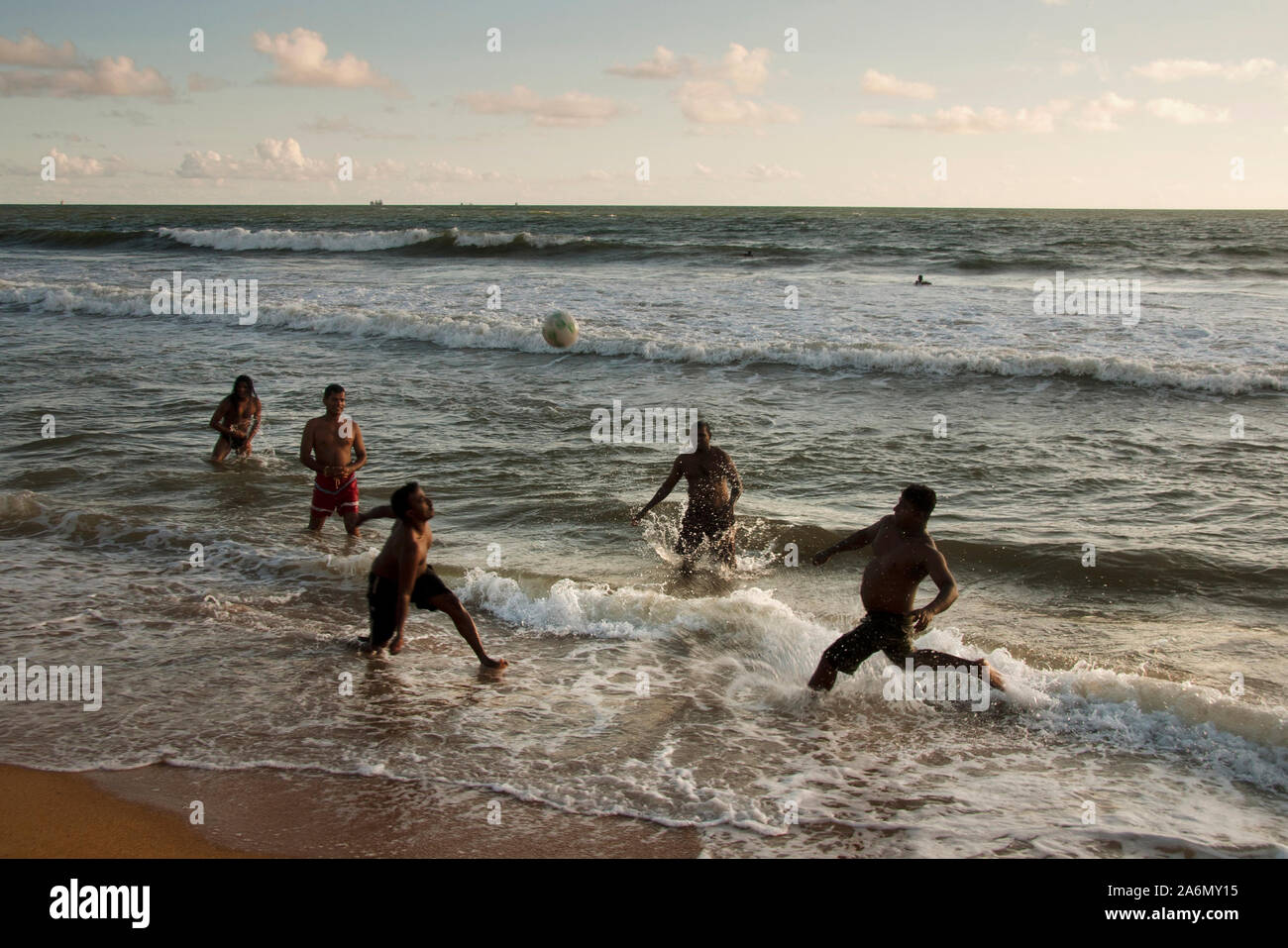 Men playing beach volleyball at Mount Lavinia beach, Colombo, Sri Lanka