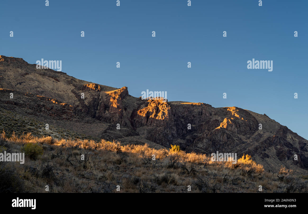 Rugged mountain ridge at sunset. Stock Photo