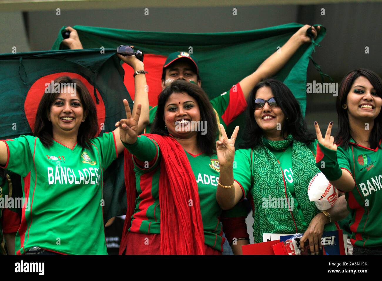 Bangladeshi cricket fans cheering for their team during the opening match of the 10th ICC Cricket World Cup, in Sher-e-Bangla National Stadium, on 19th February, 2011.  Mirpur, Dhaka, Bangladesh. Stock Photo