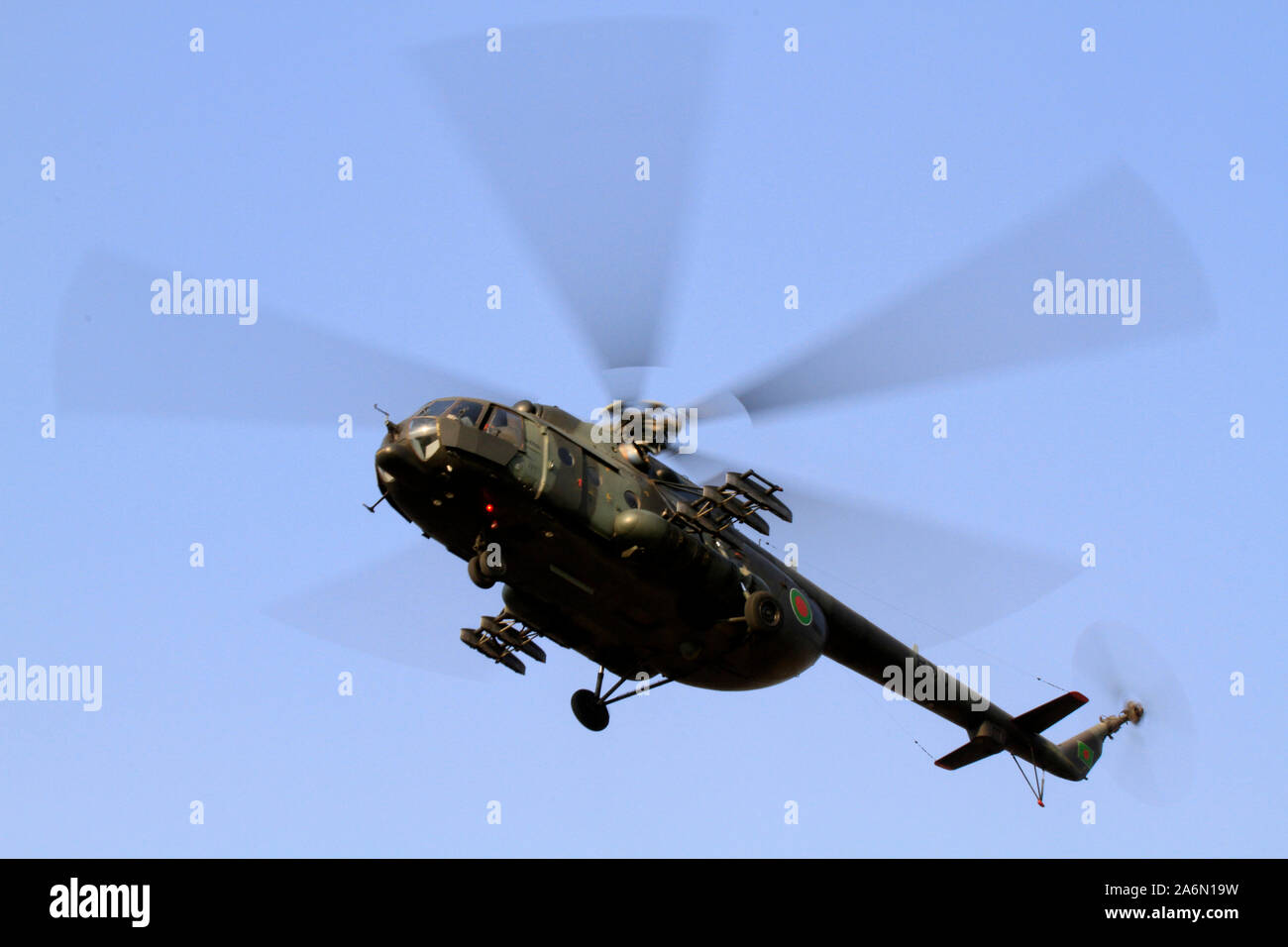 Part of heightened security during the ICC Cricket World Cup 2011, a helicopter flies over Sher-e-Bangla National Stadium in Mirpur, Dhaka, Bangladesh. February 12, 2011. Stock Photo
