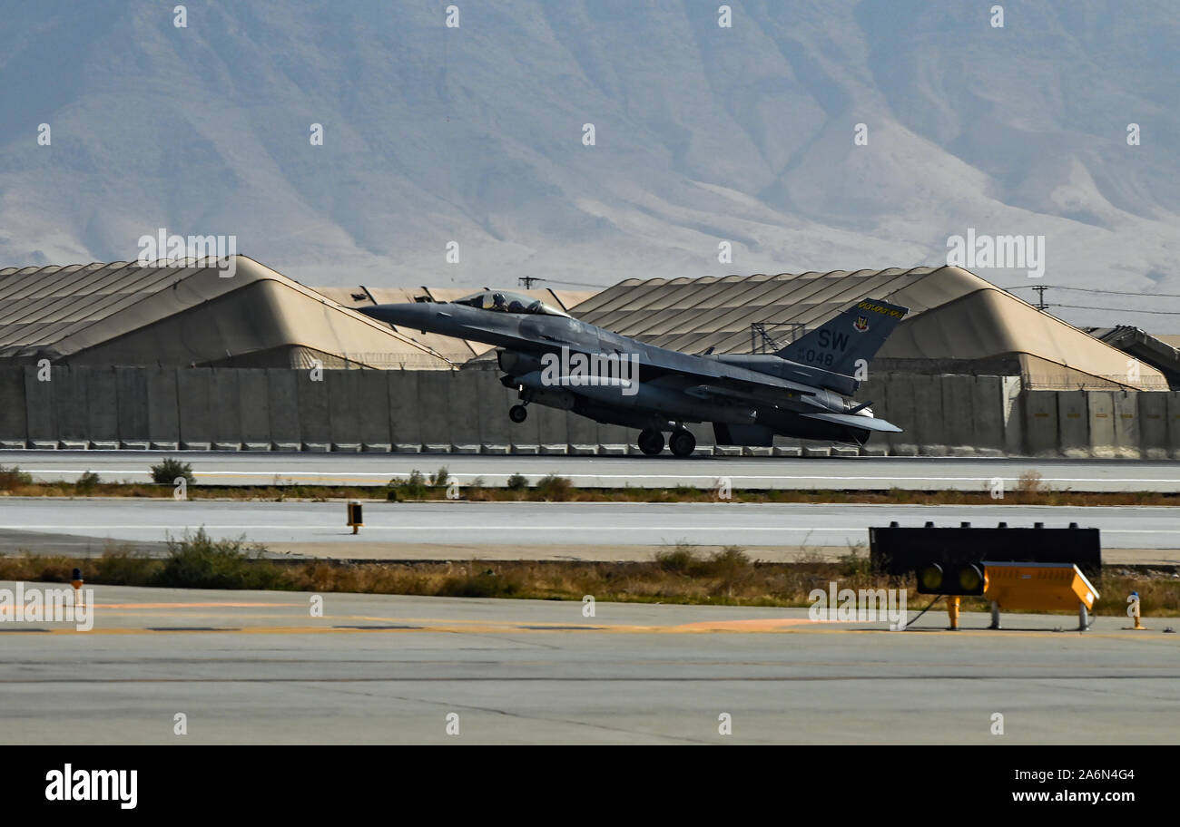 A U.S. Air Force F-16 Fighting Falcon from the 79th Fighter Squadron at Shaw Air Force Base, S.C., arrives at Bagram Airfield, Afghanistan, Oct. 26, 2019. While assigned to the 455th Air Expeditionary Wing at Bagram, the F-16s will help provide decisive airpower through the U.S. Central Command area of responsibility. The airpower the wing provides ensures NATO forces can focus on their mission to train, advise and assist. (U.S. Air Force photo by Staff Sgt. Matthew Lotz) Stock Photo