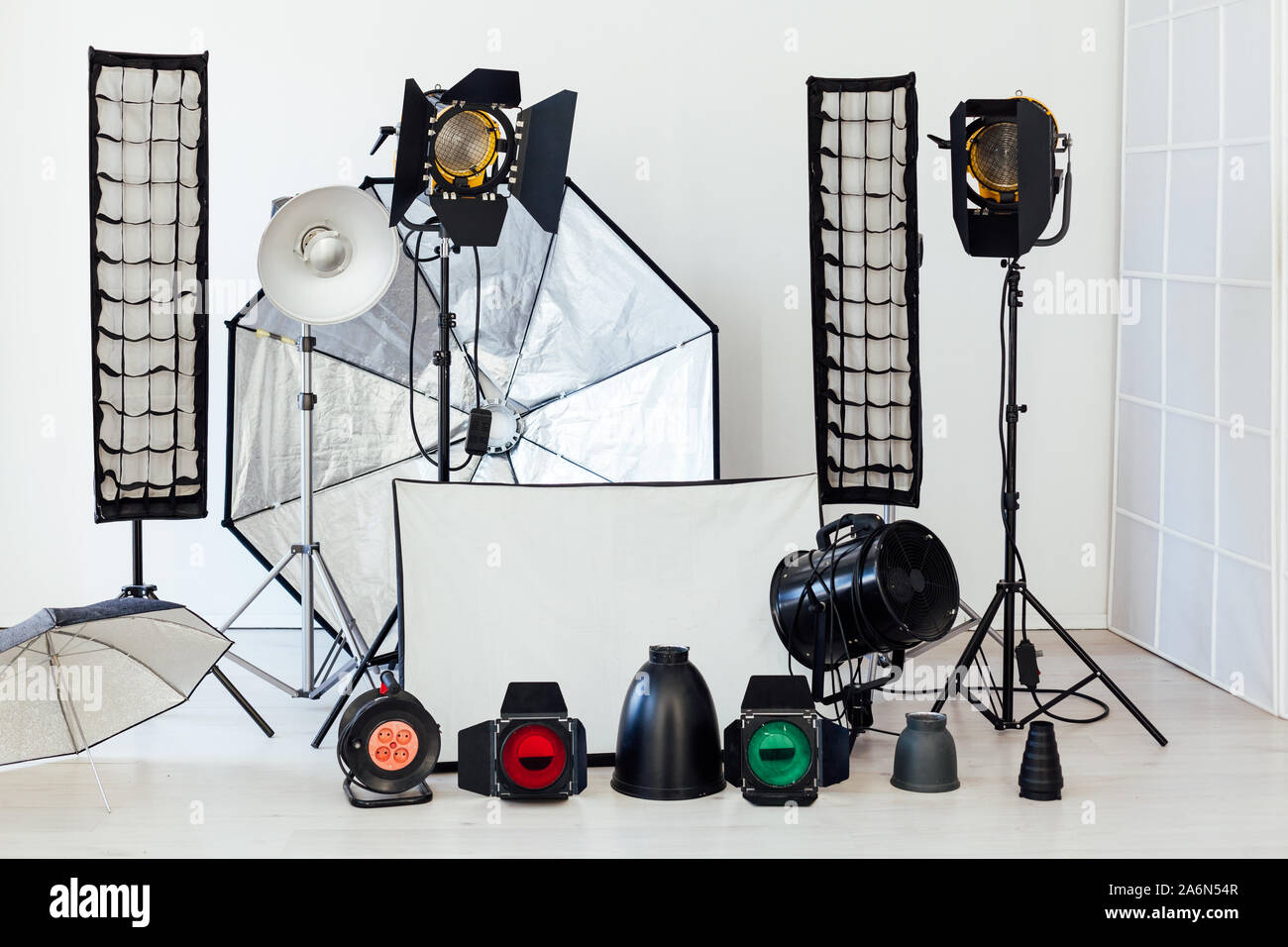 Photo studio equipment flash light accessories photographer on white  background Stock Photo - Alamy