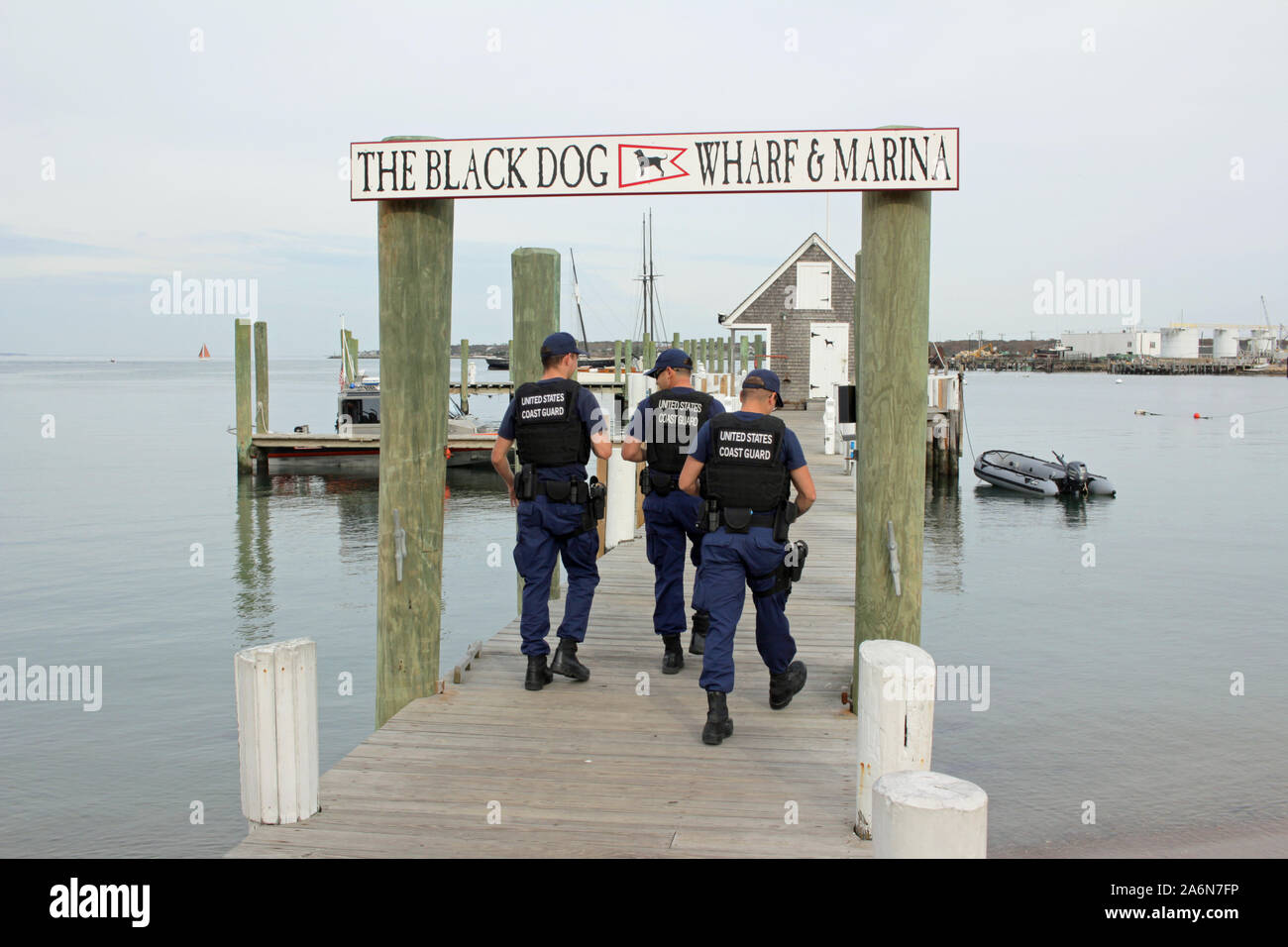 United States Coast Guard officers at Black Dog Wharf, Vineyard Haven, Martha’s Vineyard, Massachusetts, USA Stock Photo