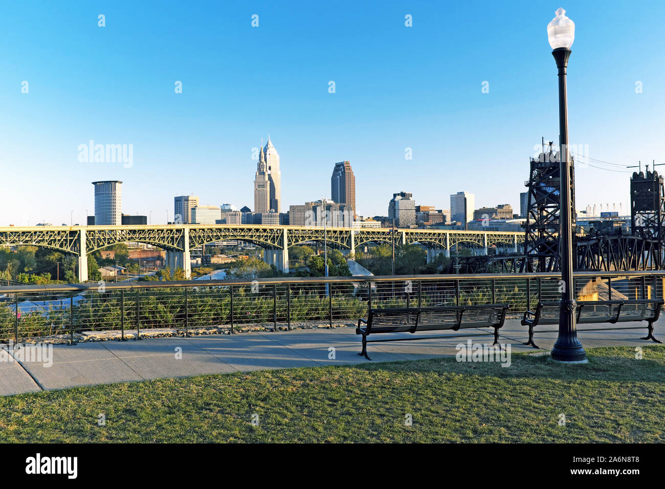 The Cleveland skyline at dusk as viewed from a public park area in the