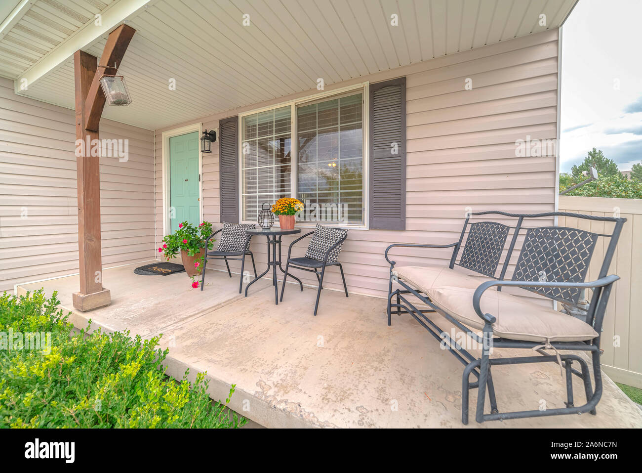 Front Porch Of Modern Home With Outdoor Furniture Stock Photo Alamy