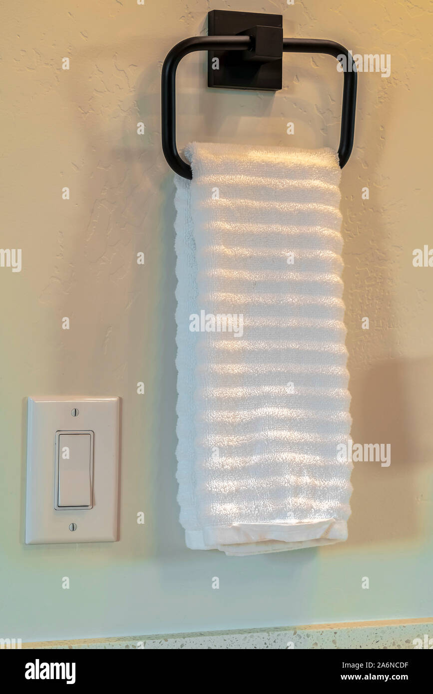 Clean fresh white towel hanging on a towel rail Stock Photo Alamy