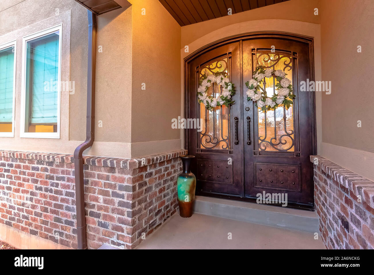 Arched Double Door Entrance With Reflections Outside Stock