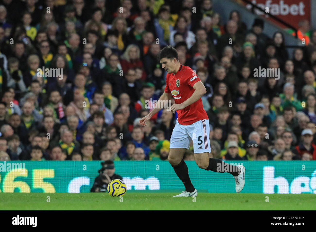 27th October 2019, Carrow Road, Norwich, England; Premier League, Norwich City v Manchester United : Harry Maguire (5) of Manchester United in action during the game  Credit: Mark Cosgrove/News Images Stock Photo