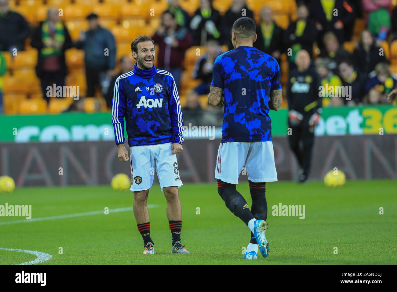 27th October 2019, Carrow Road, Norwich, England; Premier League, Norwich City v Manchester United : Juan Mata (8) of Manchester United full of laughter with Marcos Rojo (16) of Manchester United during the warmup session  Credit: Mark Cosgrove/News Images Stock Photo