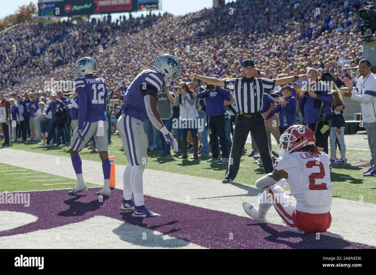 Manhattan, Kansas, USA. 26th Oct, 2019. Kansas State Wildcats defensive back AJ Parker (12) taunts Oklahoma Sooners wide receiver CeeDee Lamb (2) after Parker breaks up a touchdown pass intended for during the NCAA Football Game between the Oklahoma Sooners and the Kansas State Wildcats at Bill Snyder Family Stadium in Manhattan, Kansas. Kendall Shaw/CSM/Alamy Live News Stock Photo