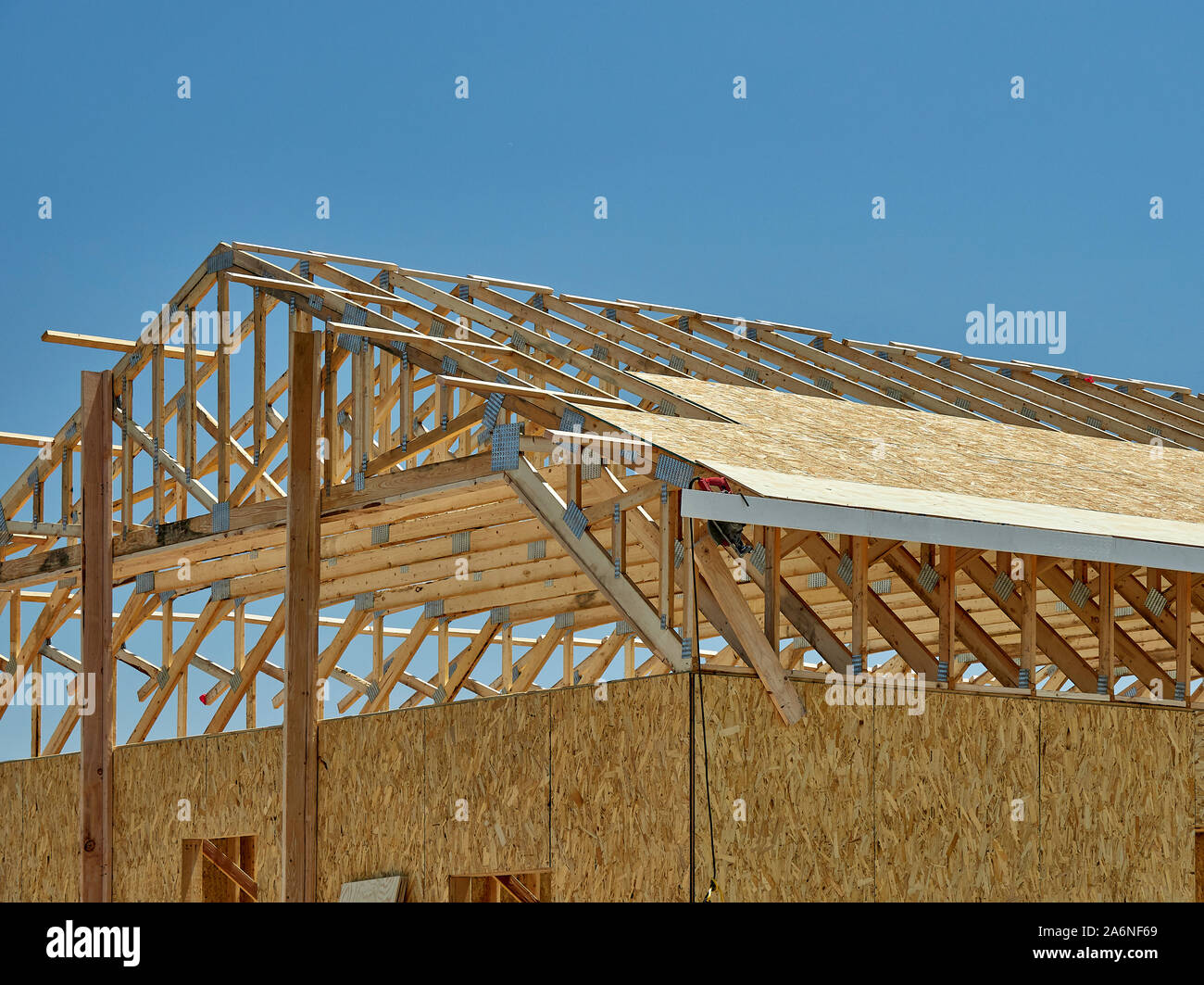 Construction Carpentry building truss frame jobsite wood Stock Photo