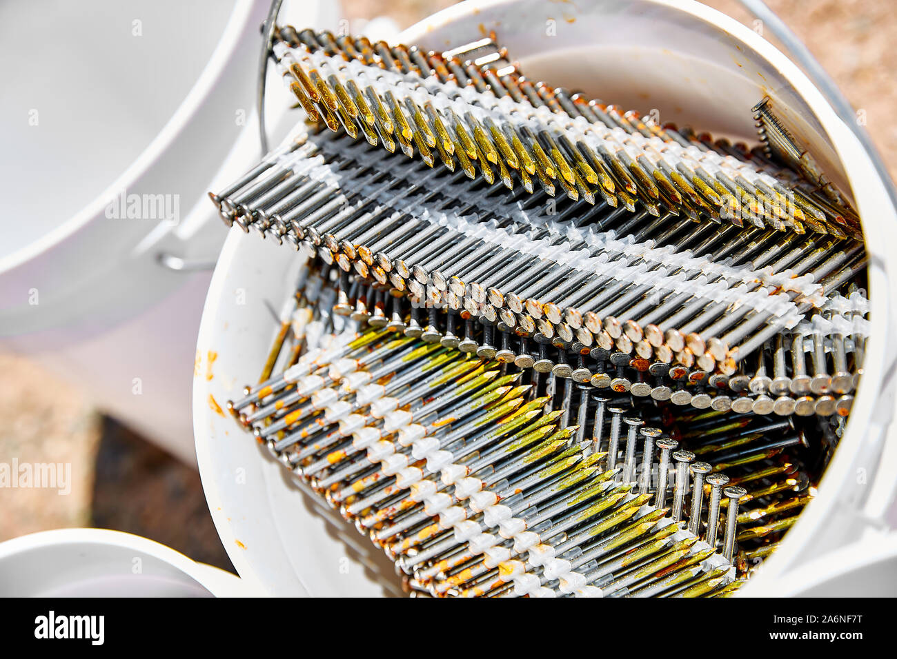 nail gun nails rack construction carpentry Stock Photo - Alamy