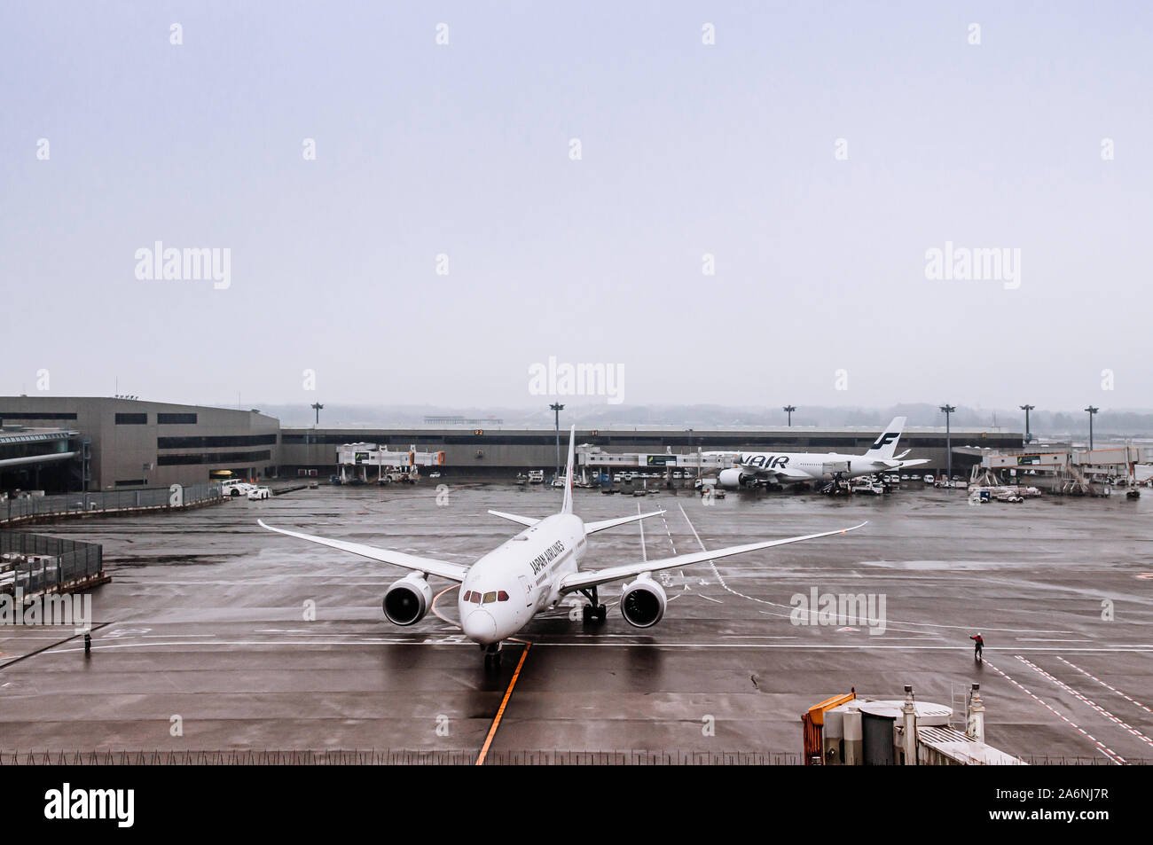 DEC 6, 2018 Narita, Japan Airplane during raining bad weather at