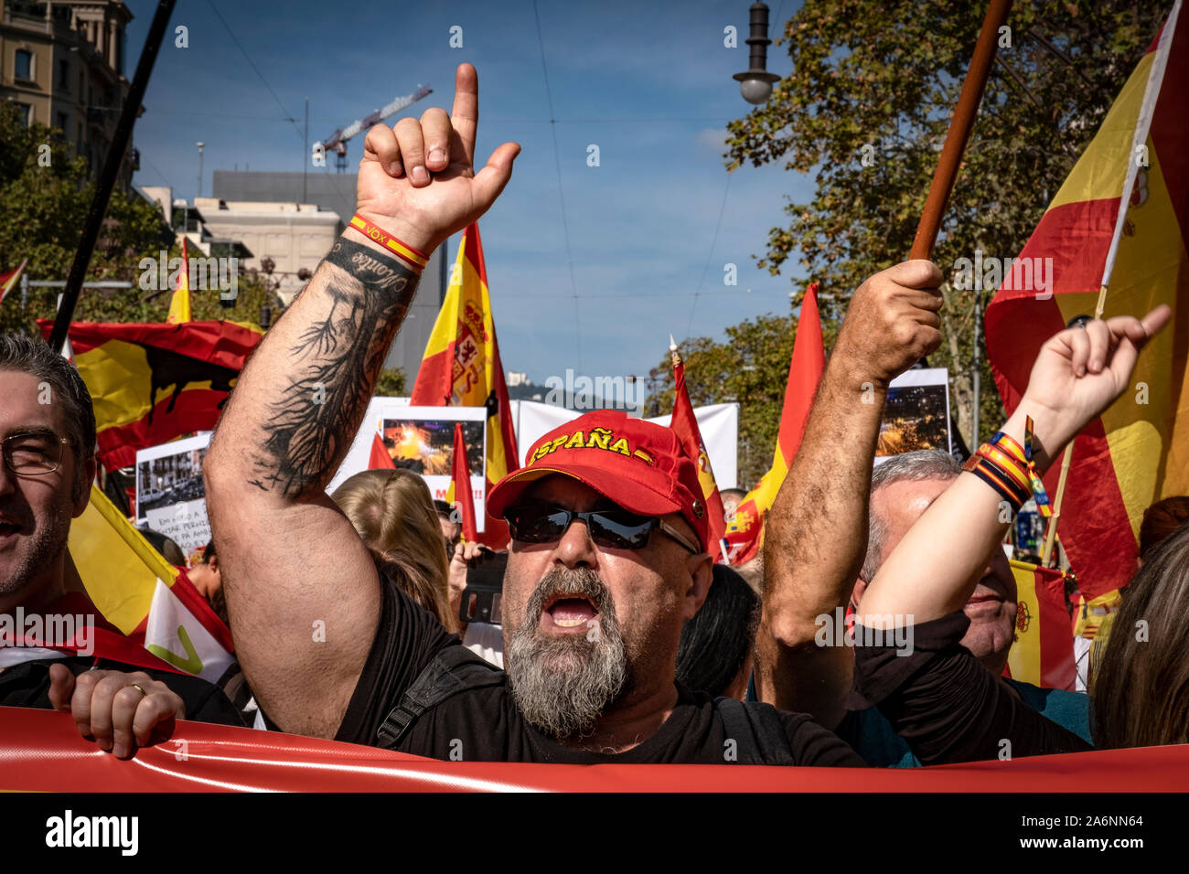Barcelona, Spain. 27th Oct, 2019. A protester shouting slogans during the demonstration.Great constitutional mobilisation in Barcelona. According to sources from the Urban Guard, the demonstration has brought together 80,000 people who have demonstrated under the motto: For Concord, for Catalonia, Enough! Credit: SOPA Images Limited/Alamy Live News Stock Photo