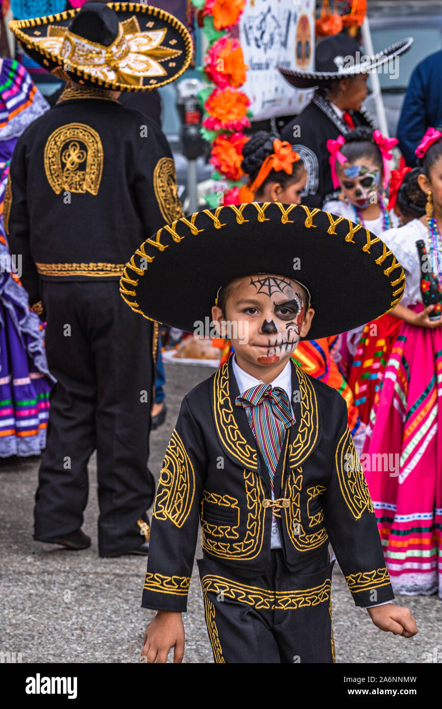 Young boy in mariachi band at Dia de los Muertos festival, day of the dead, in San Pedro, California Stock Photo