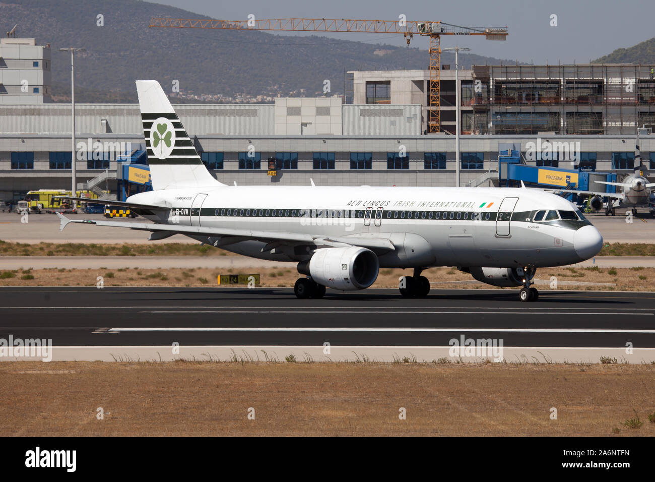An Aer Lingus Airbus 320 in retro livery running out Athens' airport. Stock Photo