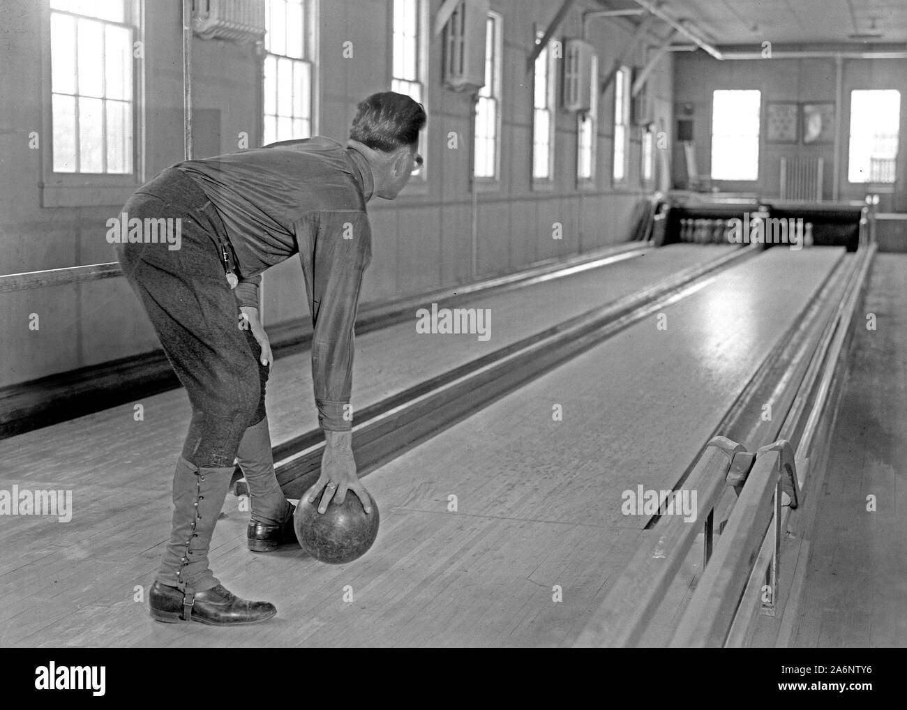 Blind man bowling at bowling alley at Institute for the Blind in Washington D.C. ca. 1918 Stock Photo