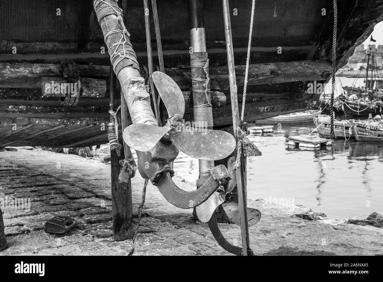 Old rusty boat propeller in Dalian harbor, China, 22-8-19 Stock Photo