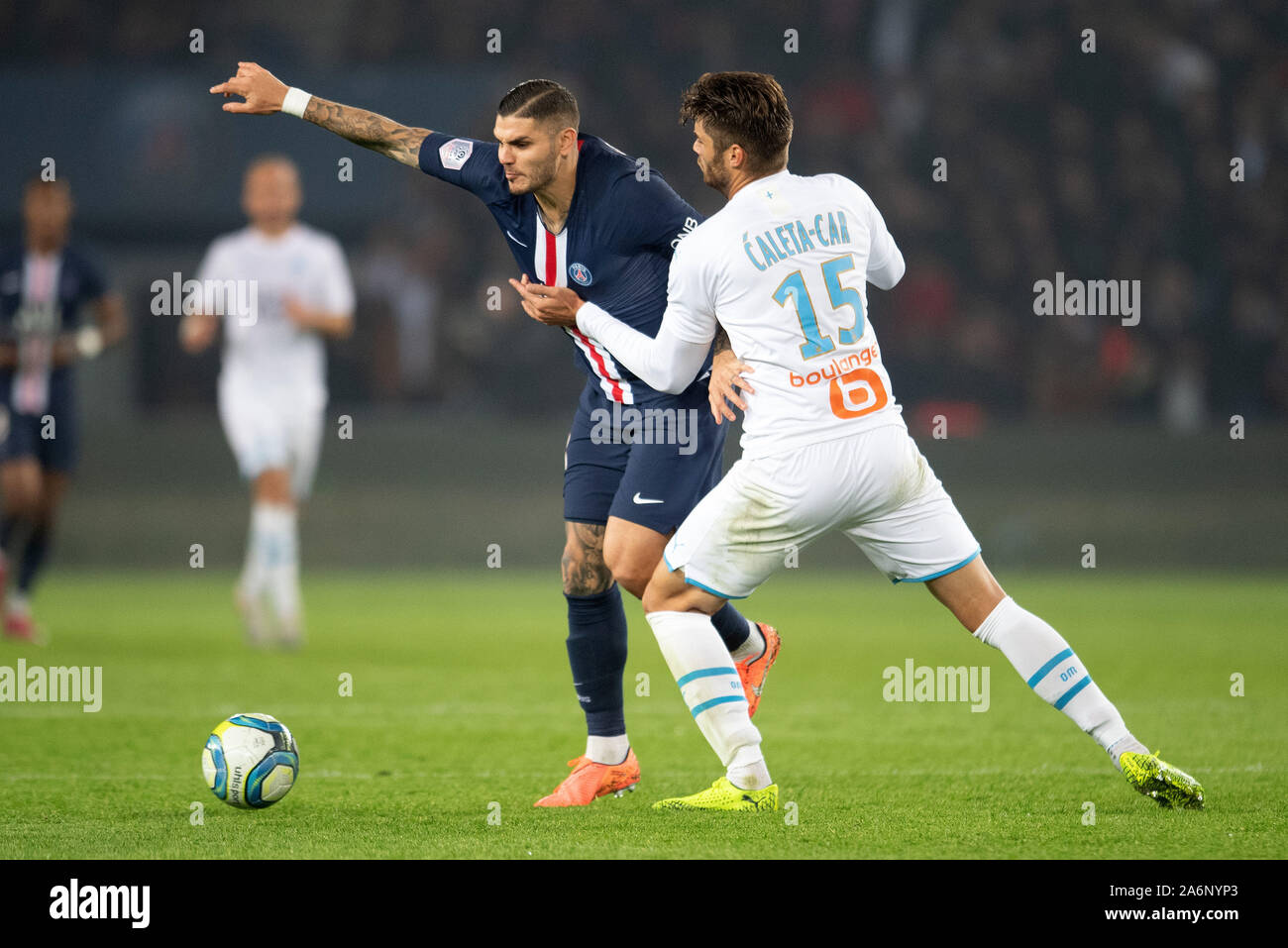 Paris, France. 27th Oct, 2019. Mauro Icardi (front L) of Paris Saint-Germain vies with Duje Caleta-Car of Olympique of Marseille during the Ligue 1 match at the Parc des Princes in Paris, France on Oct. 27, 2019. Credit: Jack Chan/Xinhua/Alamy Live News Stock Photo