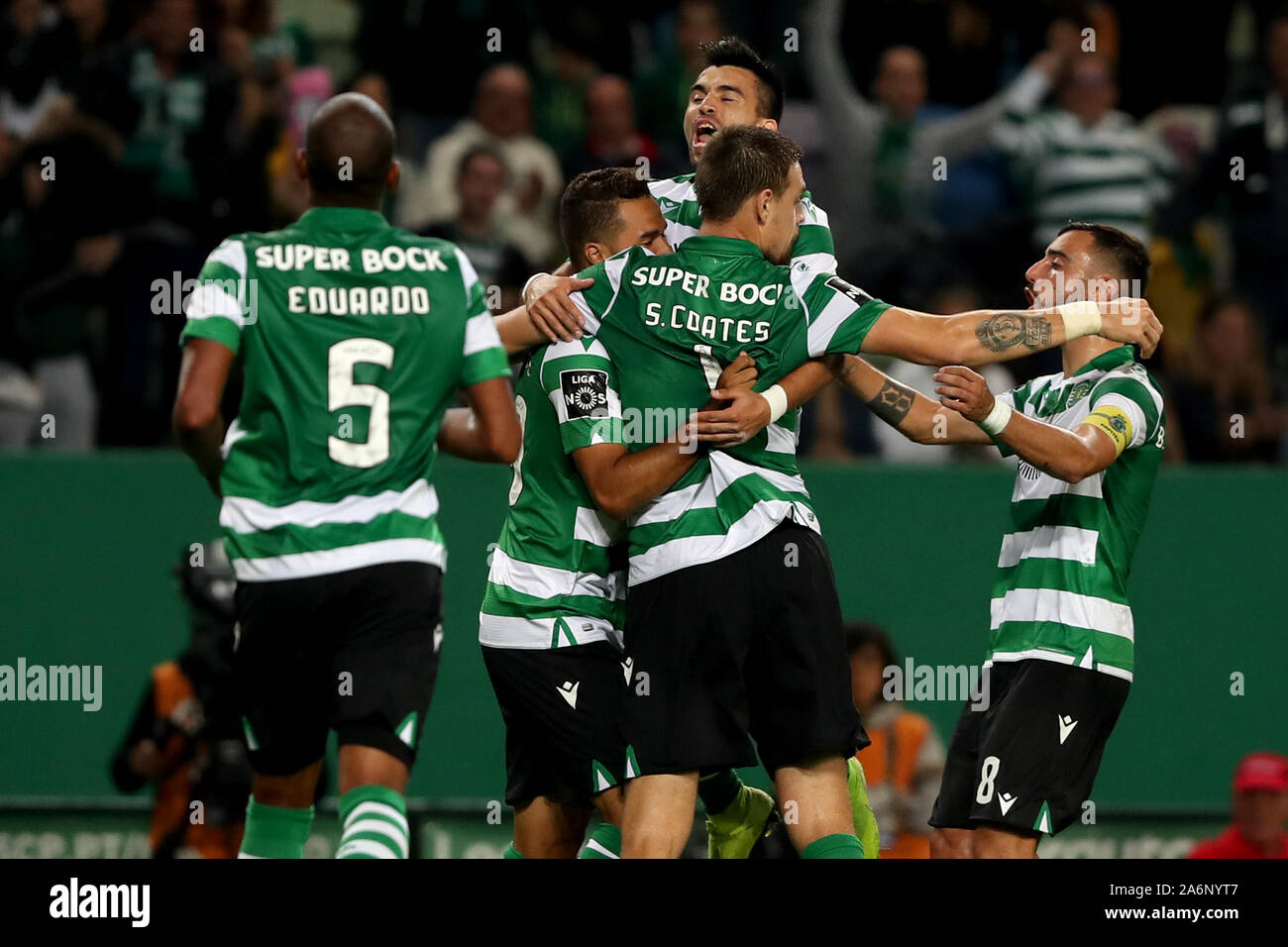 Lisbon, Portugal. 27th Oct, 2019. Sebastian Coates (2nd R) of Sporting CP celebrates with teammates after scoring during the Portuguese League football match in Lisbon, Portugal, Oct. 27, 2019. Credit: Pedro Fiuza/Xinhua/Alamy Live News Stock Photo