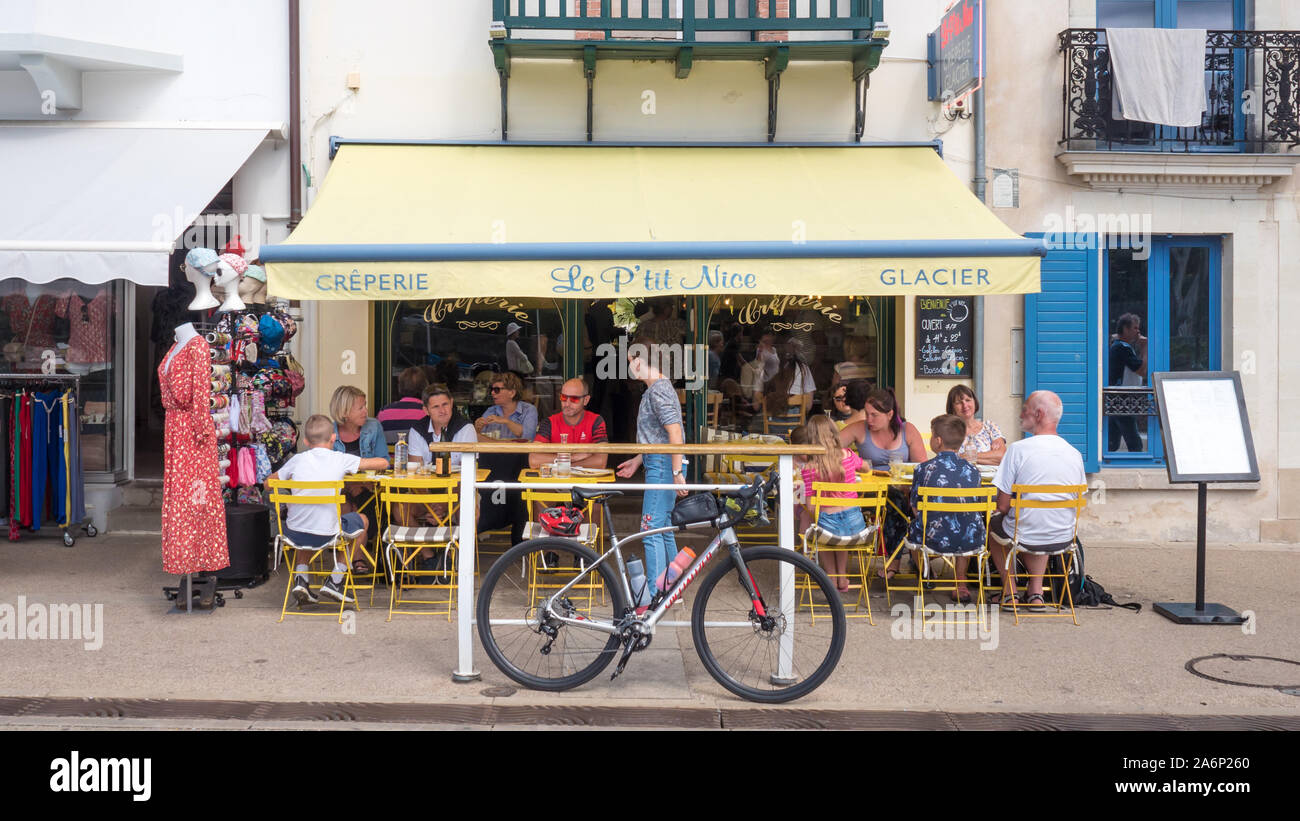 bicycle parked in front of french traditional crepe restaurant, Pornic, France 10-8-10 Stock Photo
