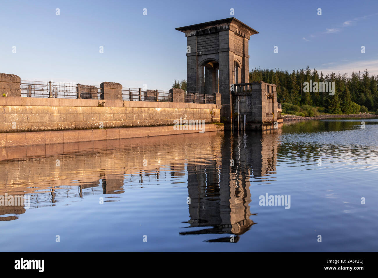 Alwen reservoir dam with reflection, North Wales on a sunny afternoon Stock Photo
