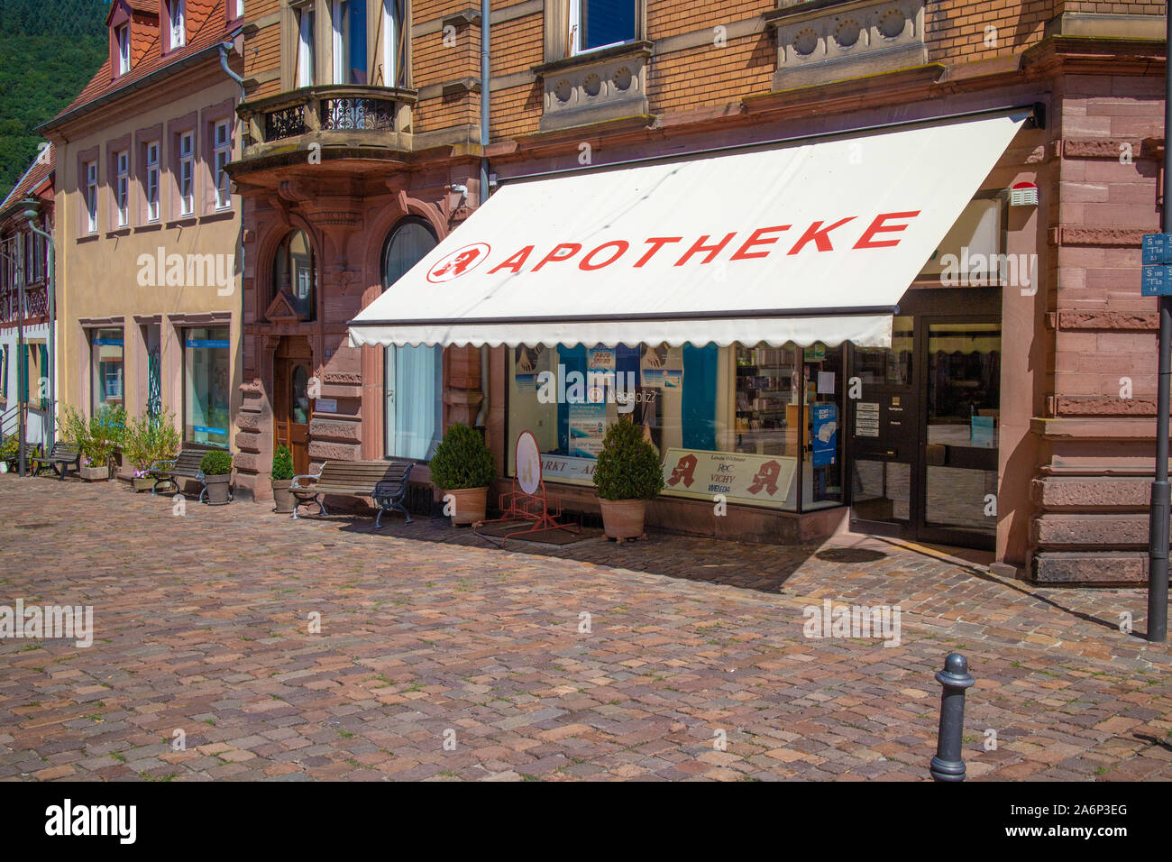 Neckargemünd, Germany - August 18, 2019: Exterior view of a pharmacy in Neckargemünd, Southern Germany with sun protection sail Stock Photo