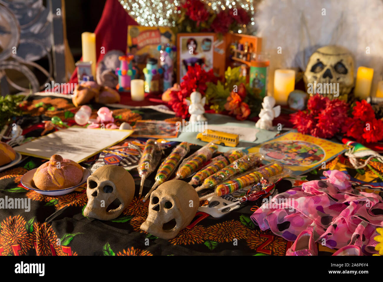 Offerings are left for loved ones at a large community altar at the Dia