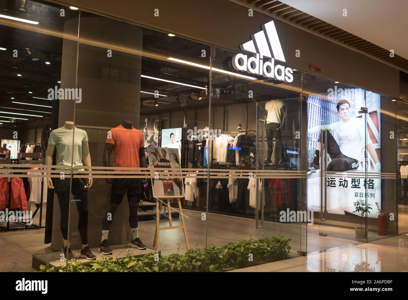 ADIDAS in China: Shop facade during a special sale, This Famous German brand makes popular sports clothing, China 17 june 2019 Stock Photo