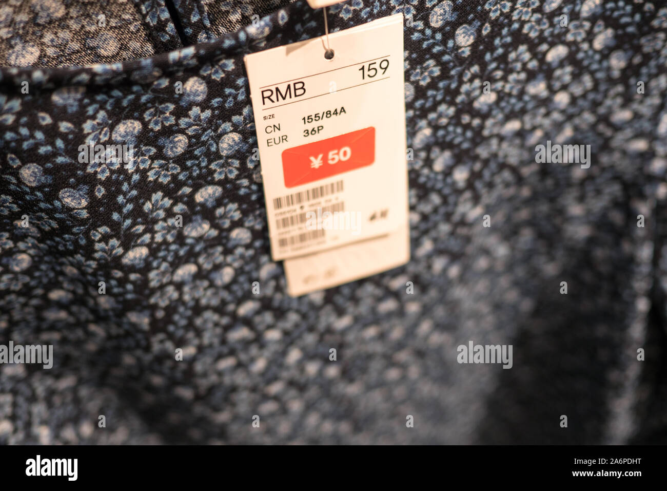 Price tag during special discount sale in H&M Clothes shop China with soft  blurred background, 17 june 2019 Stock Photo - Alamy