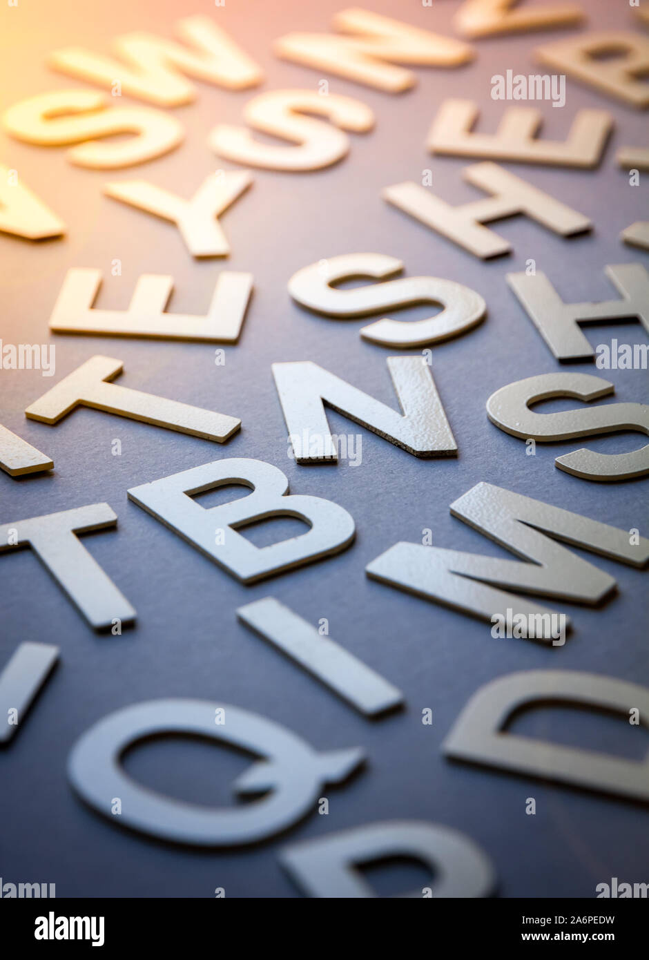 Mixed solid letters pile closeup photo. Education background concept Stock Photo