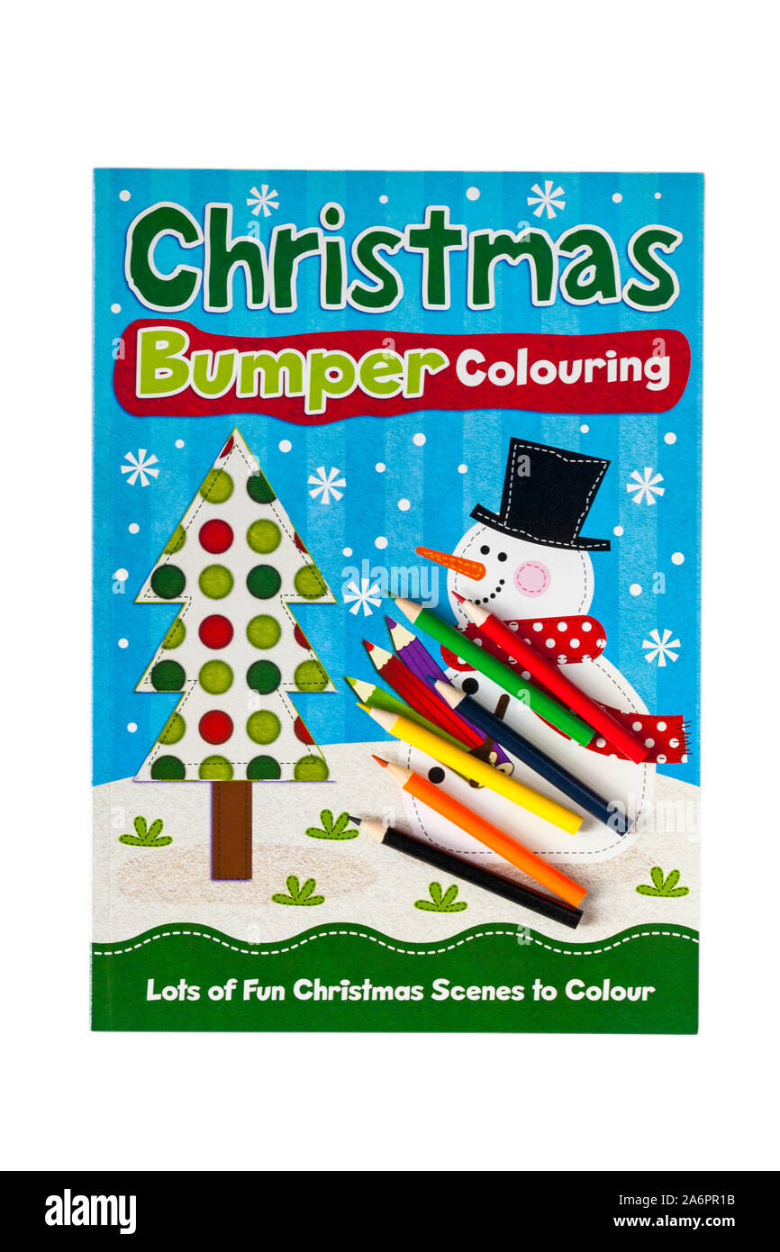 Christmas Bumper Colouring book with colouring pencils isolated on ...