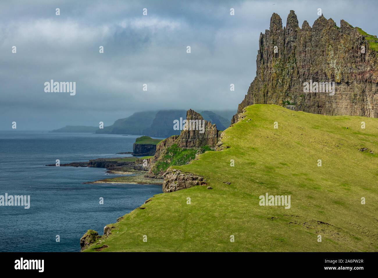 Amazing profile view of Tindholmur and coast, Faroe Islands Stock Photo ...