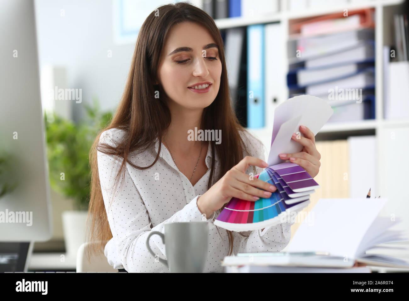 Businesslady imagining project of house Stock Photo