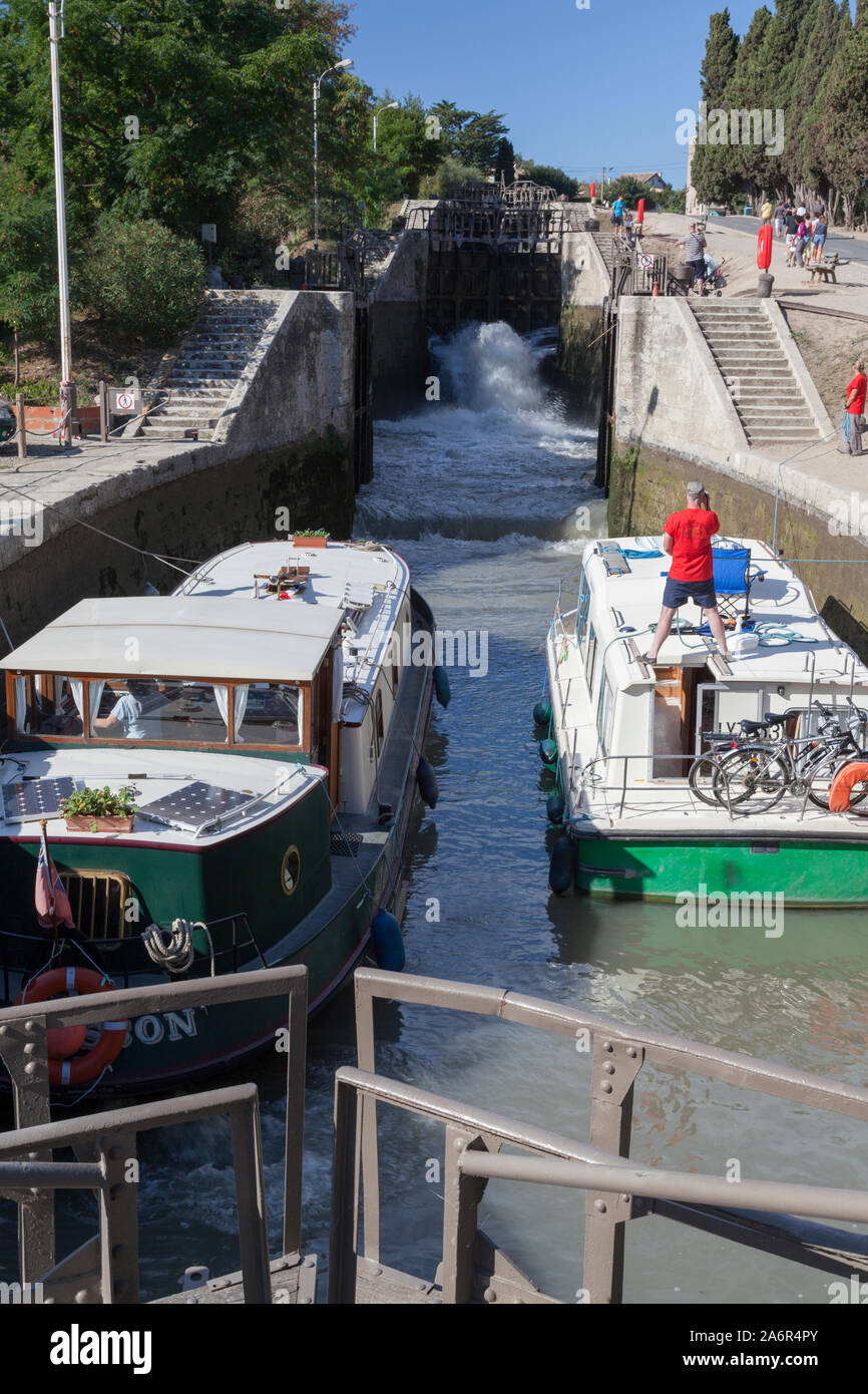 France, Languedoc, Beziers, canal barges passing through the famous neuf ecluses (eight locks) de Fonserannes along the canal du midi. Stock Photo