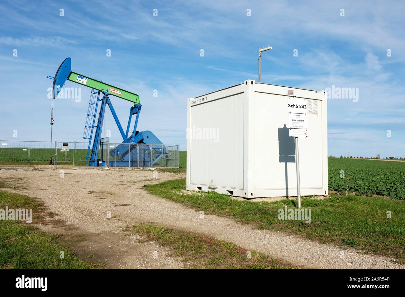 OMV pump jack mining crude oil in the Weinviertel region of lower Austria (Niederosterreich) Stock Photo