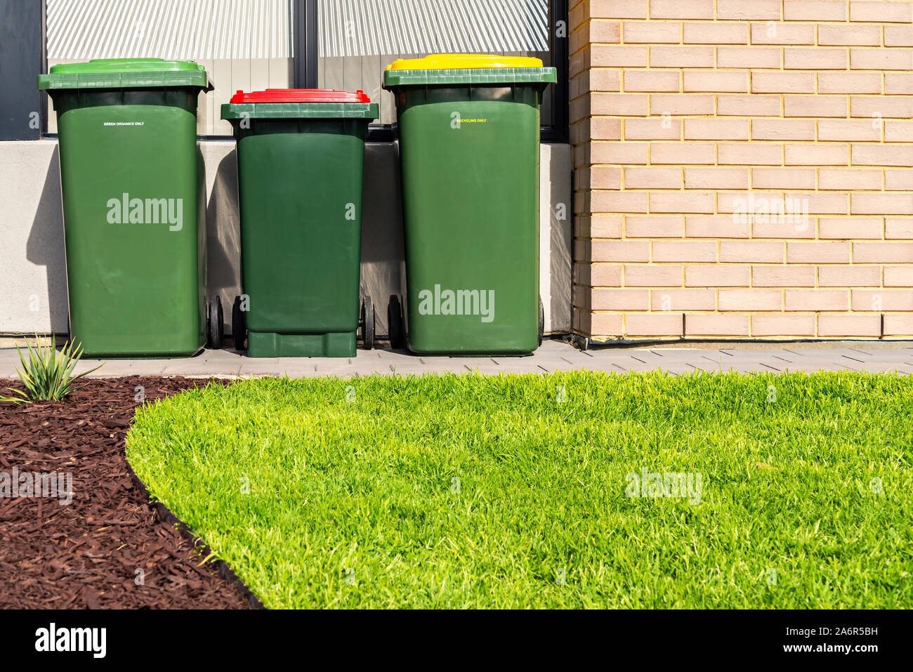 Wheelie bins front hires stock photography and images Alamy
