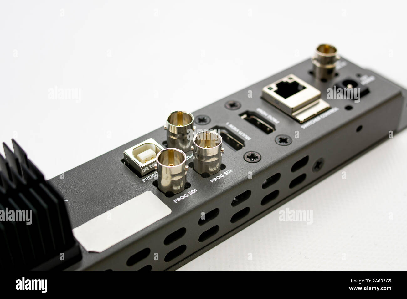 rear connectors of a live television signal realization device, with sdi, hdmi, rj45, ethernet, television antenna and usb connections for device and Stock Photo