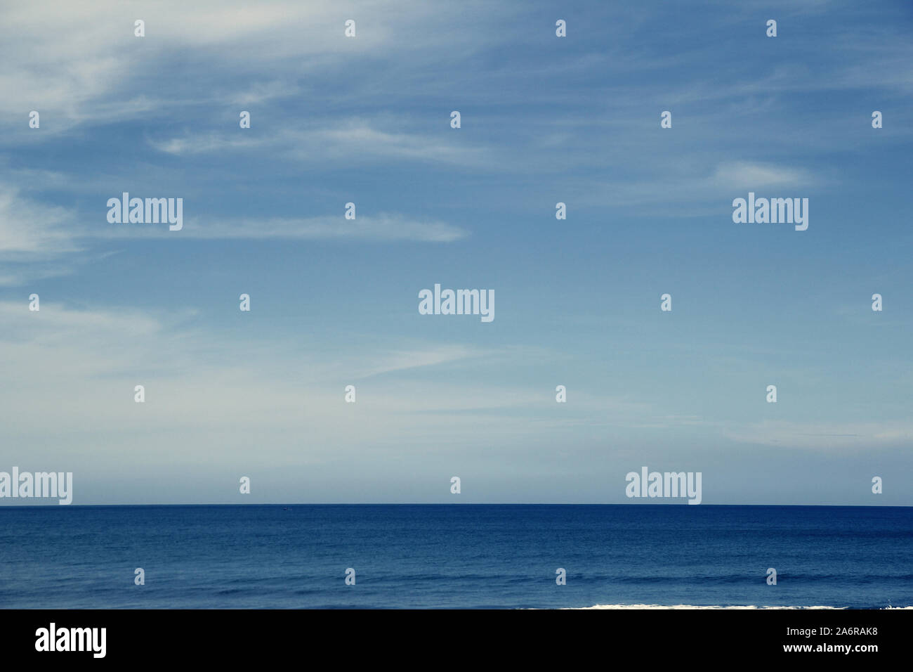 Blue ocean clouds in clear hi-res stock photography and images - Alamy