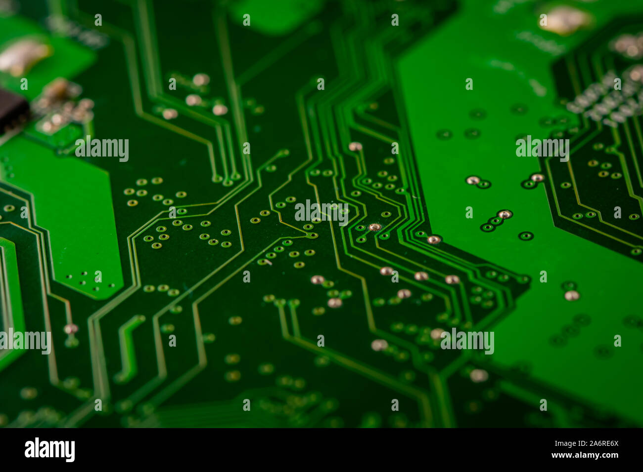 Macro photograph of a green circuit board from old electronic comptuter. Stock Photo