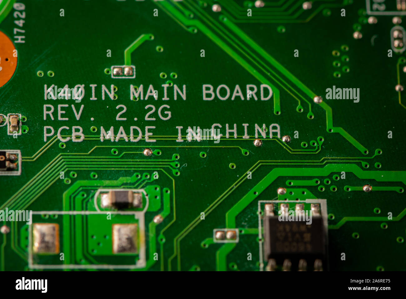 Macro photograph of a green circuit board from old electronic comptuter. Stock Photo