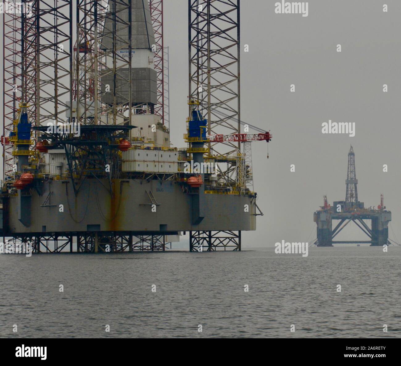 Oil Rigs in for repair off Cromarty, Scotland Stock Photo