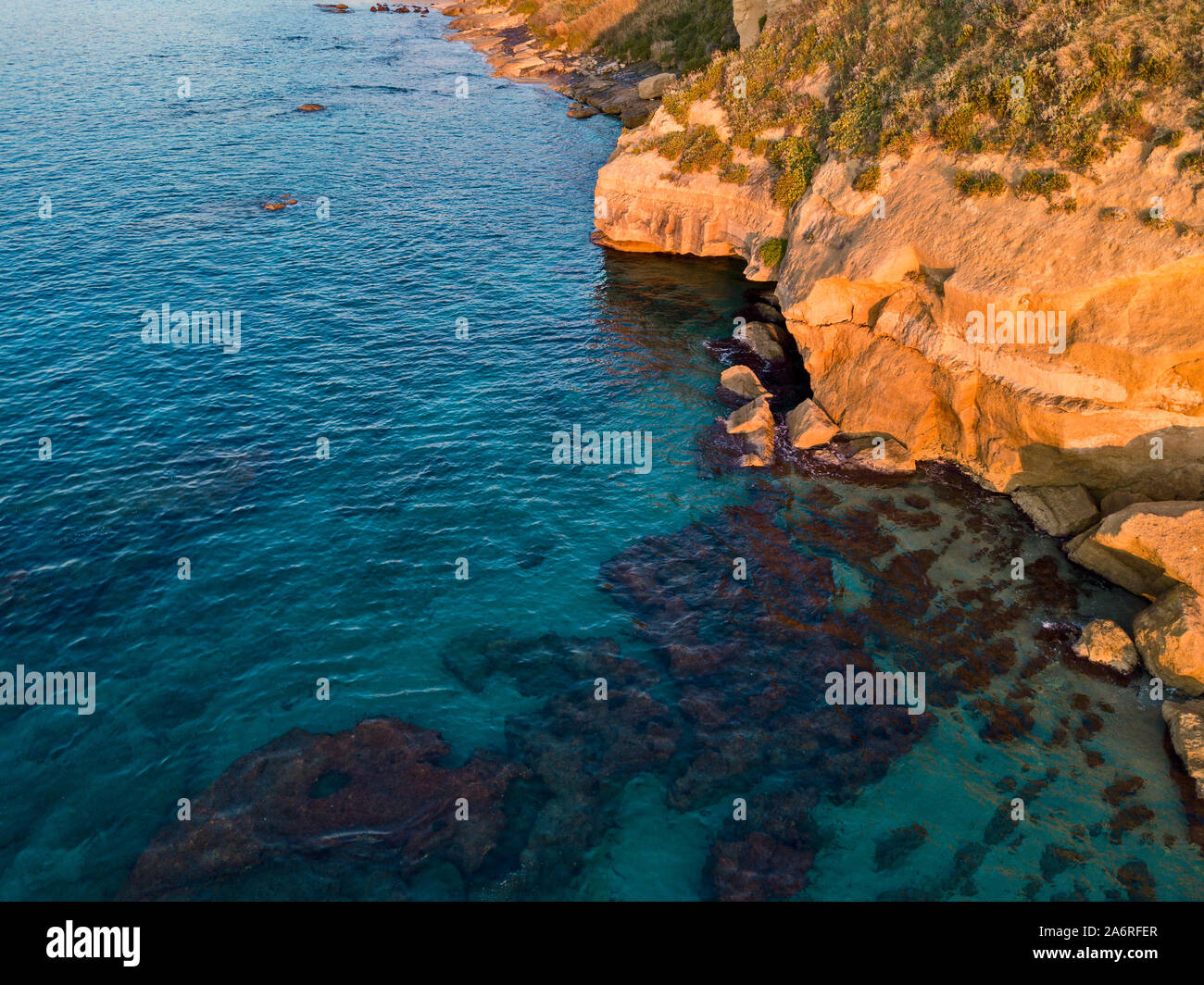 Aerial view of rocks in the sea. Overview of the seabed seen from above