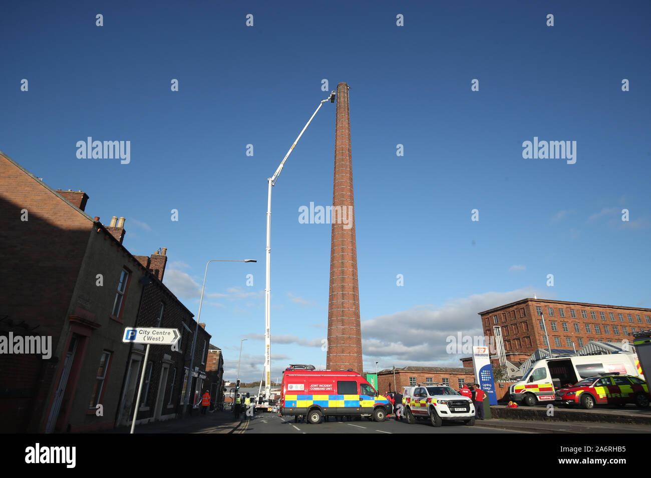 A hydraulic platform is raised at Dixon's Chimney in Carlisle, Cumbria